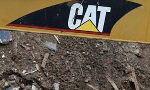 FILE PHOTO: The logo of the company of machinery Caterpillar (CAT) is seen at the site of a future urban project in Vina del Mar, Chile May 23, 2017.
