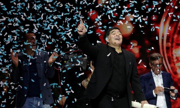 Former soccer player Diego Armando Maradona reacts on stage after receiving honorary citizenship of the city in Naples, Italy, July 5, 2017. Ciro de Luca