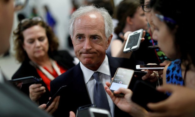 Senator Bob Corker speaks with reporters about the withdrawn Republican health care bill on Capitol Hill in Washington - REUTERS