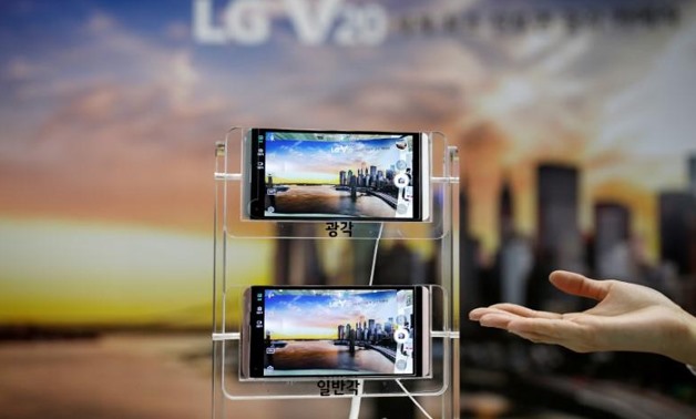 FILE PHOTO: A model demonstrates LG Electronics' V20 smartphone during Korea Electronics Show 2016 in Seoul, South Korea, October 27, 2016. Kim Hong-Ji