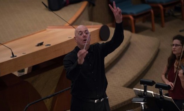 © AFP / by Shaun TANDON | Bard College President Leon Botstein, shown here conducting his American Symphony Orchestra, is a music scholar who is helping to revive little-known Dvorak opera "Dimitrij"