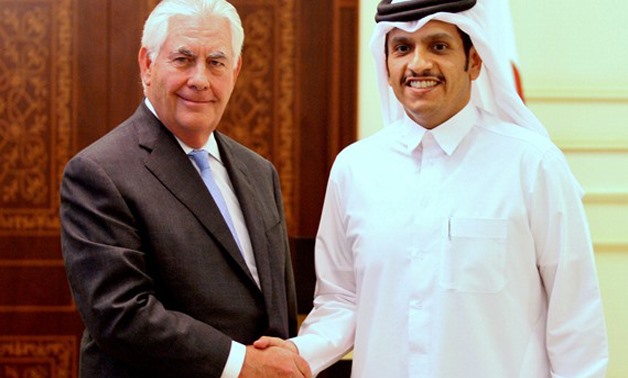 Qatar's foreign minister Sheikh Mohammed bin Abdulrahman al-Thani (R) shakes hands with U.S. Secretary of State Rex Tillerson following a joint news conference in Doha, Qatar, July 11, 2017 REUTERS/Naseem Zeitoon