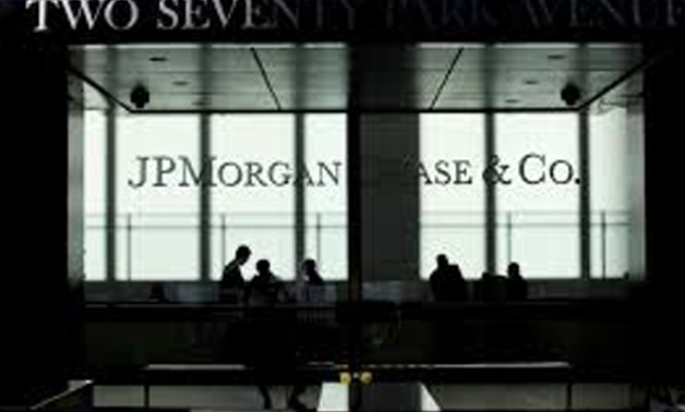 FILE PHOTO: People walk inside JP Morgan headquarters in New York, October 25, 2013.
Eduardo Munoz