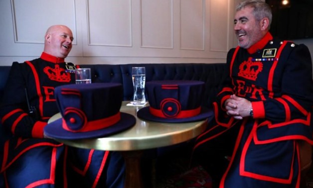 Yeoman Warders sit in the Yeoman Warders Club at the Tower of London in London - Reuters