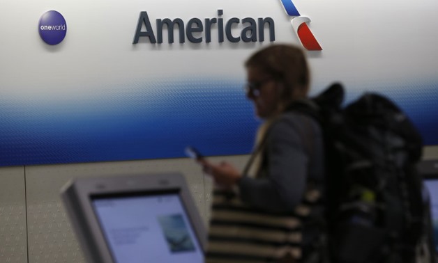 A passenger arrives to check in for an American Airlines filght at O'Hare International Airport in Chicago, Illinois, U.S.October 28, 2016. REUTERS/Jim Young