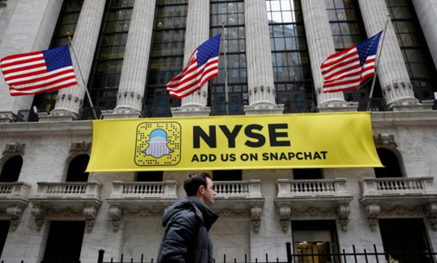 A Snapchat sign hangs on the facade of the New York Stock Exchange (NYSE) in New York City - Reuters