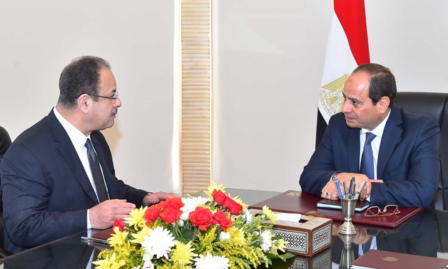  President Sisi (R) meets with Minister of Interior Magdy Abdel-Ghaffar (L) - press photo