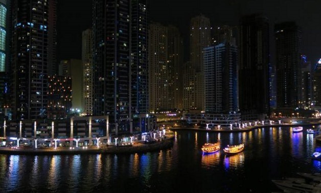 Tourist pleasure boats navigate through Dubai Marina - Reuters