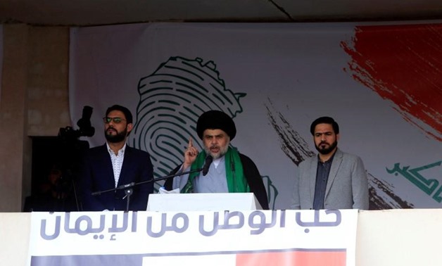 Iraqi Shi'ite cleric Moqtada al-Sadr speaks during a protest against corruption and informs his followers about his will at Tahrir Square in Baghdad, Iraq March 24, 2017.
