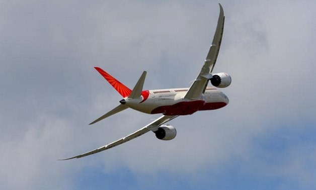 An Air India Airlines Boeing 787 dreamliner takes part in a flying display during the 50th Paris Air Show at the Le Bourget airport near Pari - Reuters