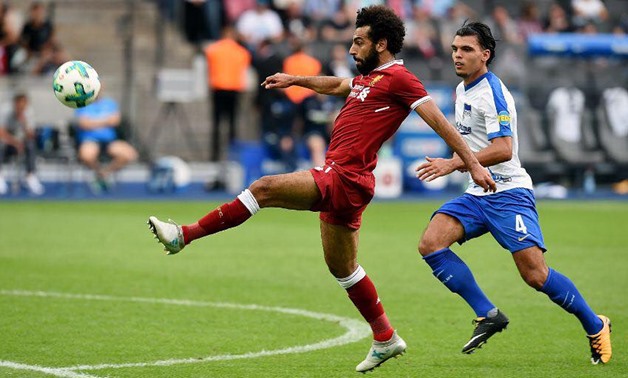 Mohamed Salah (red) – Image courtesy Liverpool’s official Facebook page