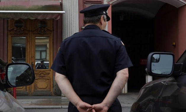 A security officer stands guard outside the U.S. consulate in St. Petersburg - REUTERS