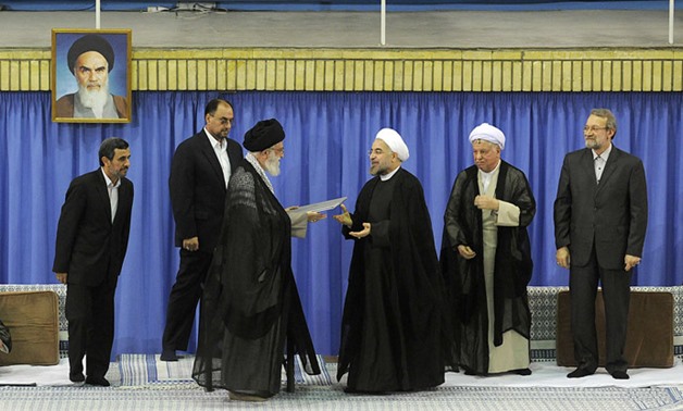 Iranian supreme leader Ali Khamenei officially endorsing Hassan Rohani August 3, 2013- File Photo.