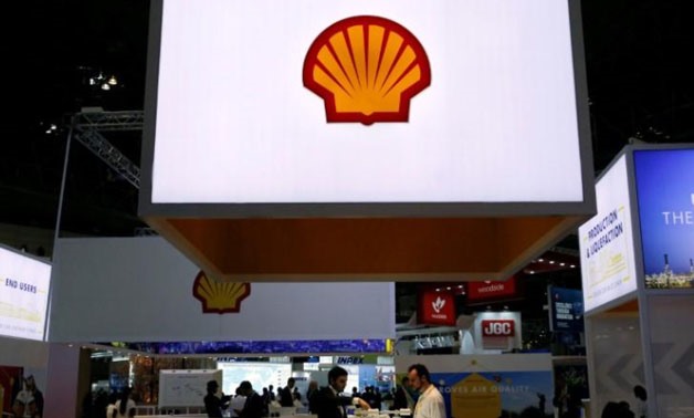 Staff members work at the booth of Royal Dutch Shell at Gastech, the world's biggest expo for the gas industry, in Chiba, Japan, April 4, 2017.
Toru Hanai