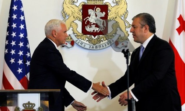 © POOL/AFP | US Vice President Mike Pence told Georgian Prime Minister Giorgi Kvirikashvili the ex-Soviet state is a "key strategic partner" for Washington

