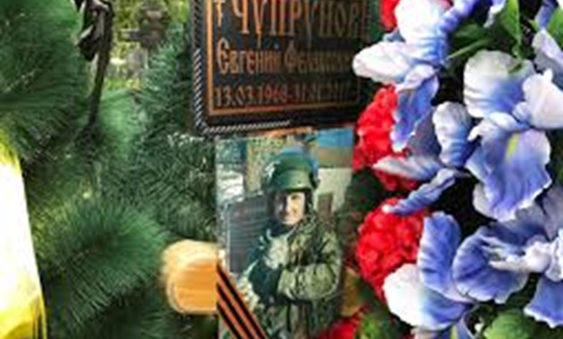 A portrait of Russian private military contractor Yevgeni Chuprunov is seen at his grave in Novomoskovsk, in Tula region, Russia June 1, 2017.
