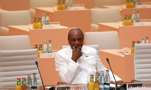 Guinea's President Alpha Conde sits prior the beginning of the third working session of the G20 meeting in Hamburg, Germany, July 8, 2017. REUTERS