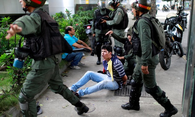 A demonstrator is detained at a rally during a strike called to protest against Venezuelan President Nicolas Maduro's government in Caracas, Venezuela, July 27, 2017 . REUTERS