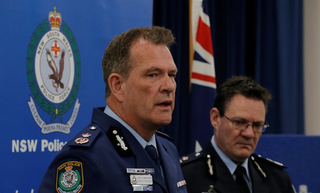 New South Wales Police Deputy Commissioner David Hudson (L) and Australian Federal Police Deputy Commissioner Michael Phelan speak at a press conference related to arrests in a foiled aircraft attack plot at the Australian Federal Police (AFP) headquarter