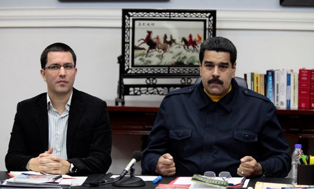 Venezuela's President Nicolas Maduro talks next to Venezuela's Vice President Jorge Arreaza during a Council of Ministers meeting at Miraflores Palace in Caracas - REUTERS