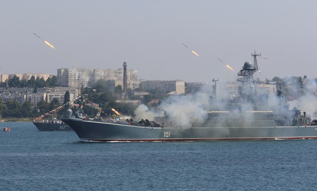The Russian large landing ship Azov fires missiles during a rehearsal for the Navy Day parade in the Black Sea port of Sevastopol, Crimea, July 27, 2017. REUTERS/Pavel Rebrov