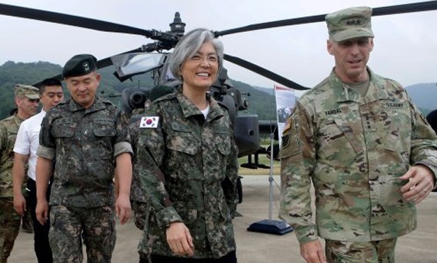 © POOL/AFP/File | South Korea's Foreign Minister Kang Kyung-Wha (centre) says she is open to talks with her North Korean counterpart