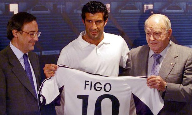 Figo signs for Real Madrid-Reuters