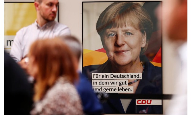 CDU presents a new poster for the upcoming election campaign with Merkel headshot in Berlin - REUTERS