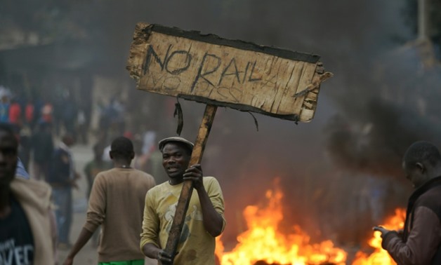 International observer missions called for calm and restraint in Kenya after isolated protests broke out following opposition leader Raila Odinga's rejection of early election results - AFP