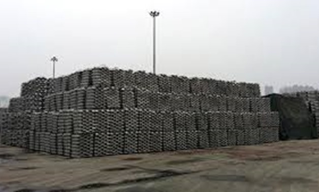 Aluminum ingots are piled up at a bonded storage area at the Dagang Terminal of Qingdao Port, in Qingdao, Shandong province June 7, 2014 - REUTERS