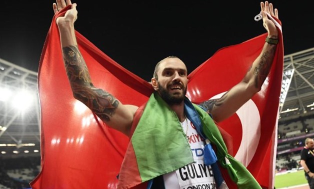 Ramil Guliyev carried both Azerbaijani and Turkish flags. – Reuters 