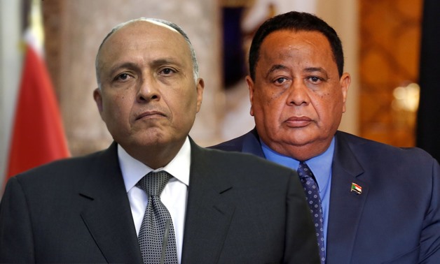 (L) Foreign Minister Sameh Shoukry, (R) Sudan's Foreign Minister Ibrahim Ghandour – File photo