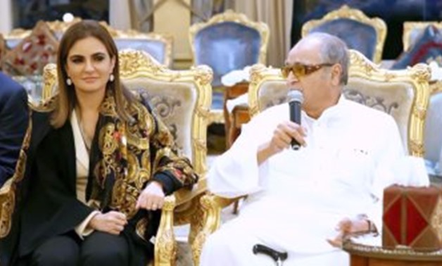 Saudi sheikh Saleh Kamel (R) and Minister of Investment Sahar Nasr (L) - File photo