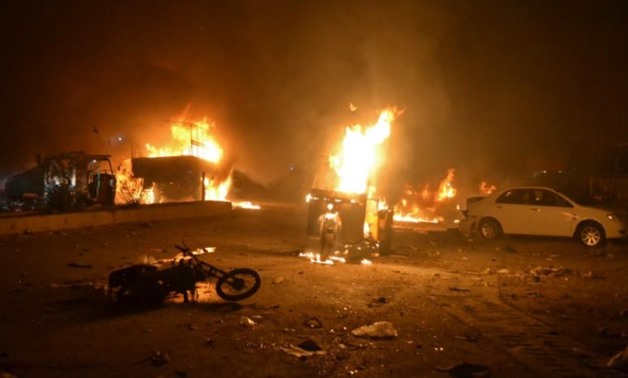 Vehicles are seen burning after a bomb blast in Quetta, Pakistan - Reuters