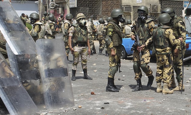 Military forces after the dispersal of Rabaa sit-in in August 2013- Reuters