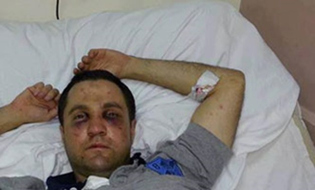 Officer Karim Emad was beaten by Morsi supporters in Rabaa on July 2, 2013 - File Photo