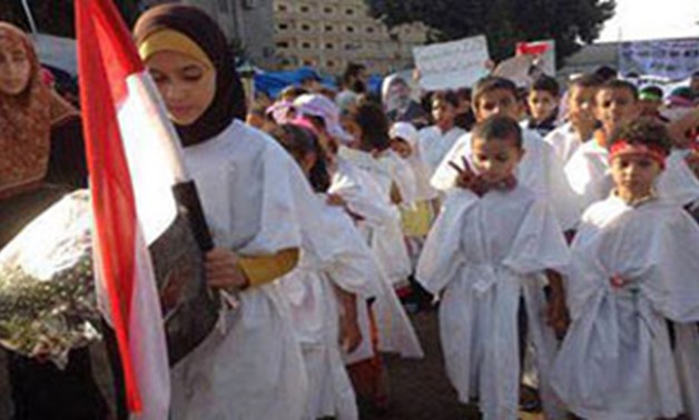 Children wearing coffins in Muslim Brotherhood demonstrations in Nasr City on July 30, 2013 – File Photo 