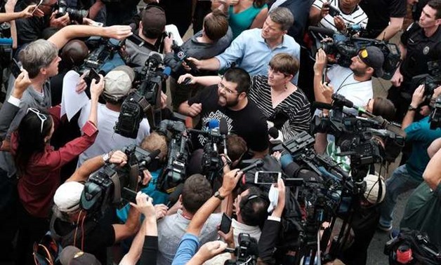 White nationalist leader Heimbach screams at media outside Charlottesville courthouse in defense of Fields as bail hearing is held in Charlottesville - REUTERS