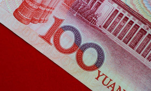 FILE PHOTO: A China yuan note is seen in this illustration photo May 31, 2017. To match Analysis CHINA-YUAN/
Thomas White/Illustration/File Photo