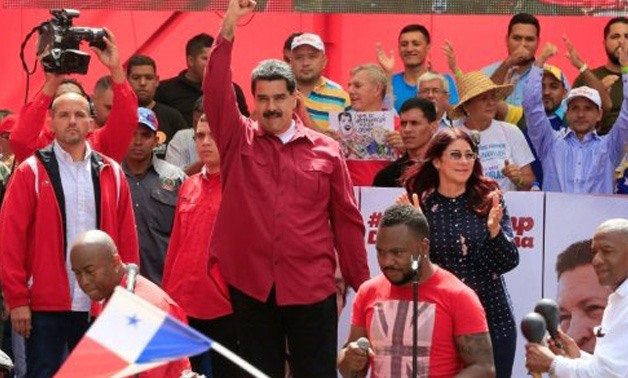 © Presidency/AFP | This handout picture released by the Venezuelan presidency shows President Nicolas Maduro addressing a rally against US President Donald Trump in Caracas on Monday