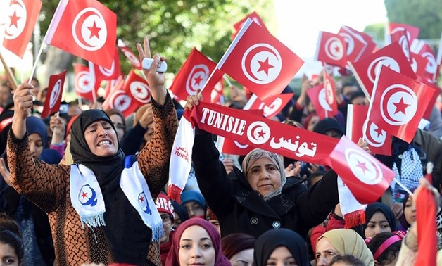  Tunisian women at a rally in Tunis marking the 5th anniversary of the 2011 revolution (AFP)