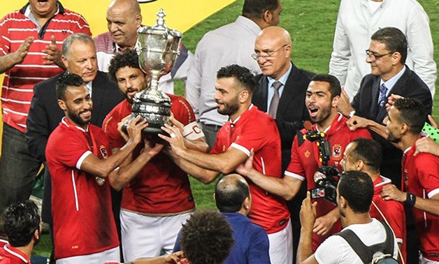 Al Ahly  players with the Egyptian Cup– Press image courtesy FIFA' official Twitter account.