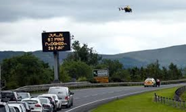 FILE PHOTO: A sign for customs and excise is seen on the motorway approaching the border between Northern Ireland and Ireland, near Newry, Northern Ireland July 13, 2017.
