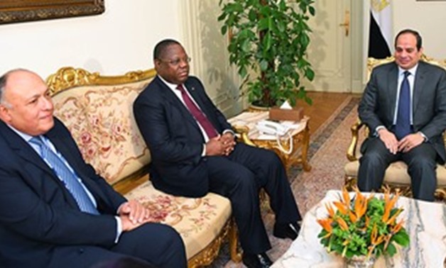 Sisi and Shoukry meet with Japon FM - File Photo