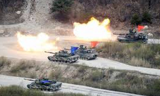 South Korean Army K1A1 and U.S. Army M1A2 tanks fire live rounds during a U.S.-South Korea joint live-fire military exercise, at a training field, near the demilitarized zone, separating the two Koreas in Pocheon, South Korea April 21, 2017.
Kim Hong-Ji