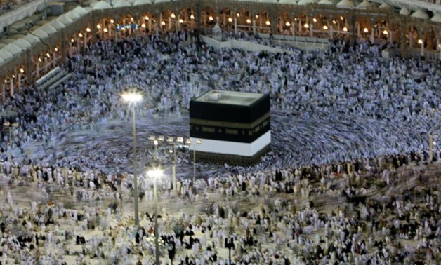 Muslims circle the Kaaba inside the Grand Mosque in Mecca - Reuters