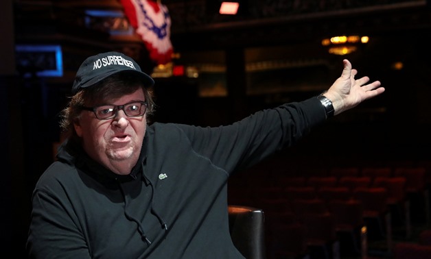 Michael Moore speaks during an interview at the site of his one-man Broadway show at the Belasco Theatre in Manhattan, New York, U.S., August 17, 2017. REUTERS/Shannon Stapleton