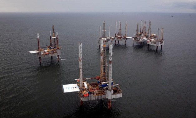 FILE PHOTO: Unused oil rigs sit in the Gulf of Mexico near Port Fourchon, Louisiana August 11, 2010.
Lee Celano
