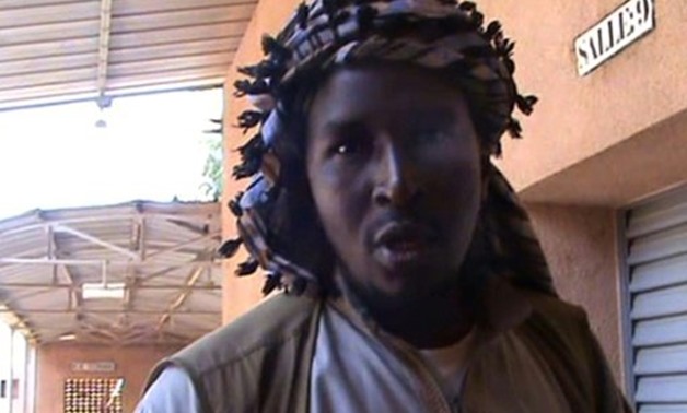 A screen grab taken from a video filmed on September 11, 2012 shows Aliou Mahamar Toure, a member of Al-Qaeda offshoot MUJAO (the Movement for Oneness and Jihad in West Africa), an Islamist group in control of Gao, standing outside a hospital