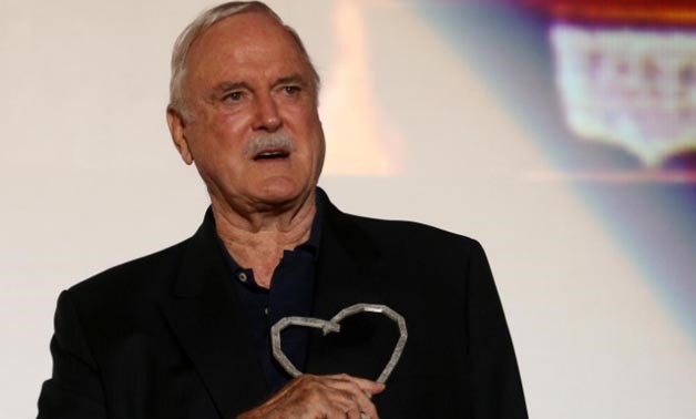 British actor John Cleese poses with the Heart of Sarajevo honorary award during the 23rd Sarajevo Film Festival in Sarajevo, Bosnia and Herzegovina, August 16, 2017.
Dado Ruvic